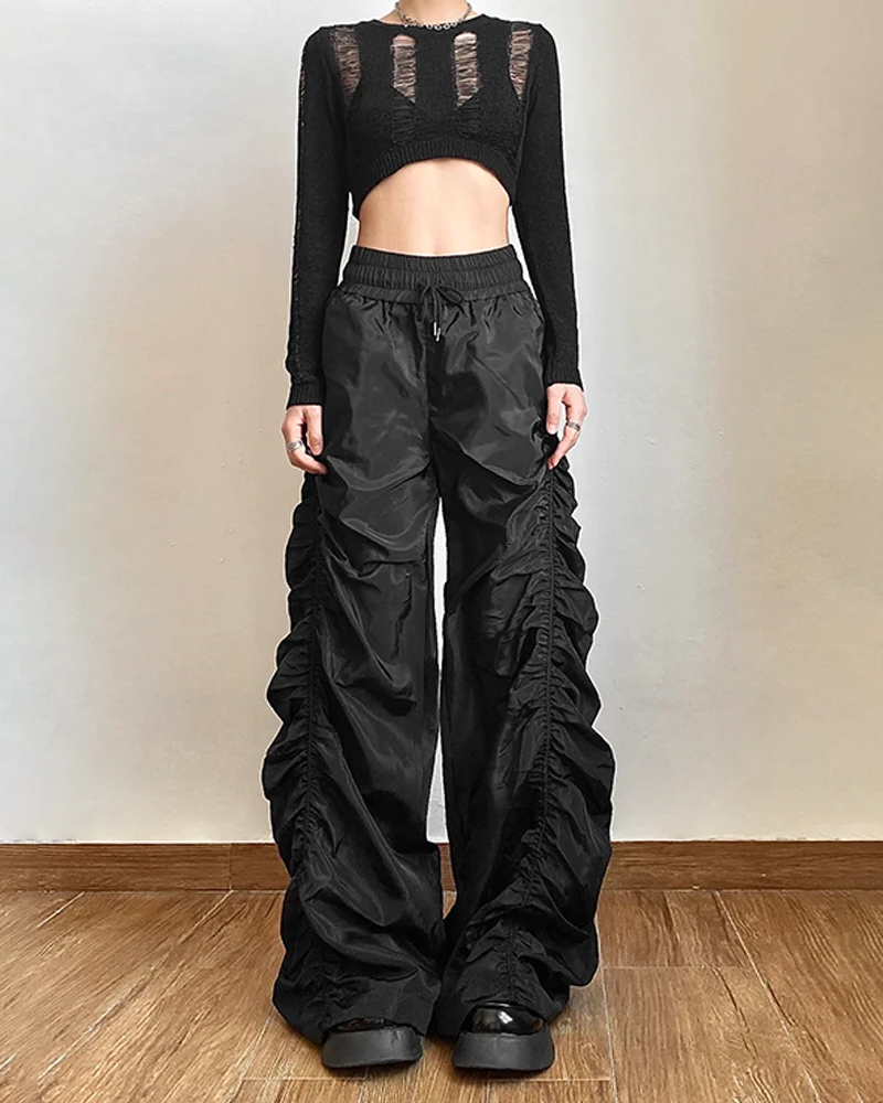 Women&#39;s black parachute pants