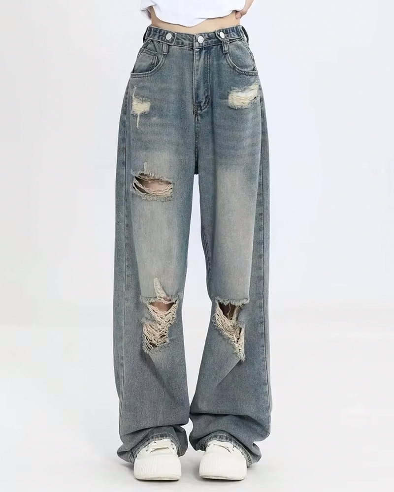 Women&#39;s distressed washed jeans