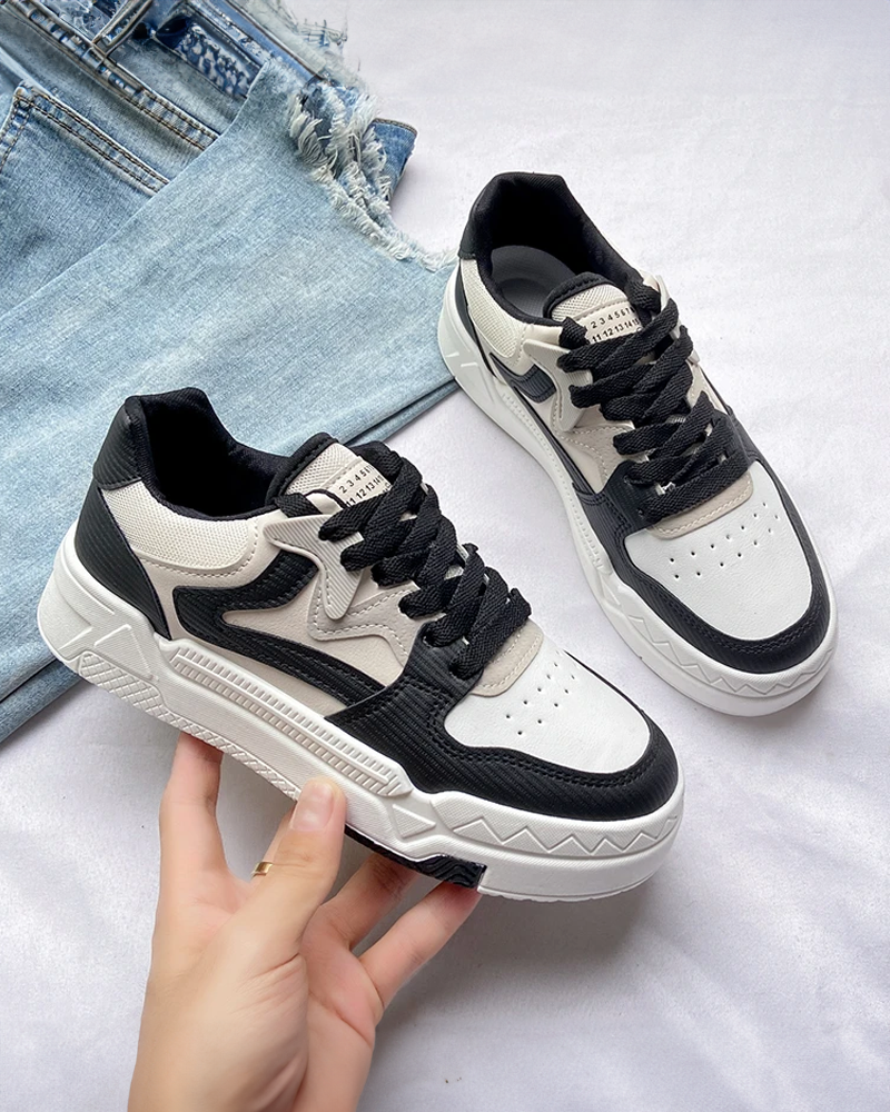 Black and white women&#39;s sneakers