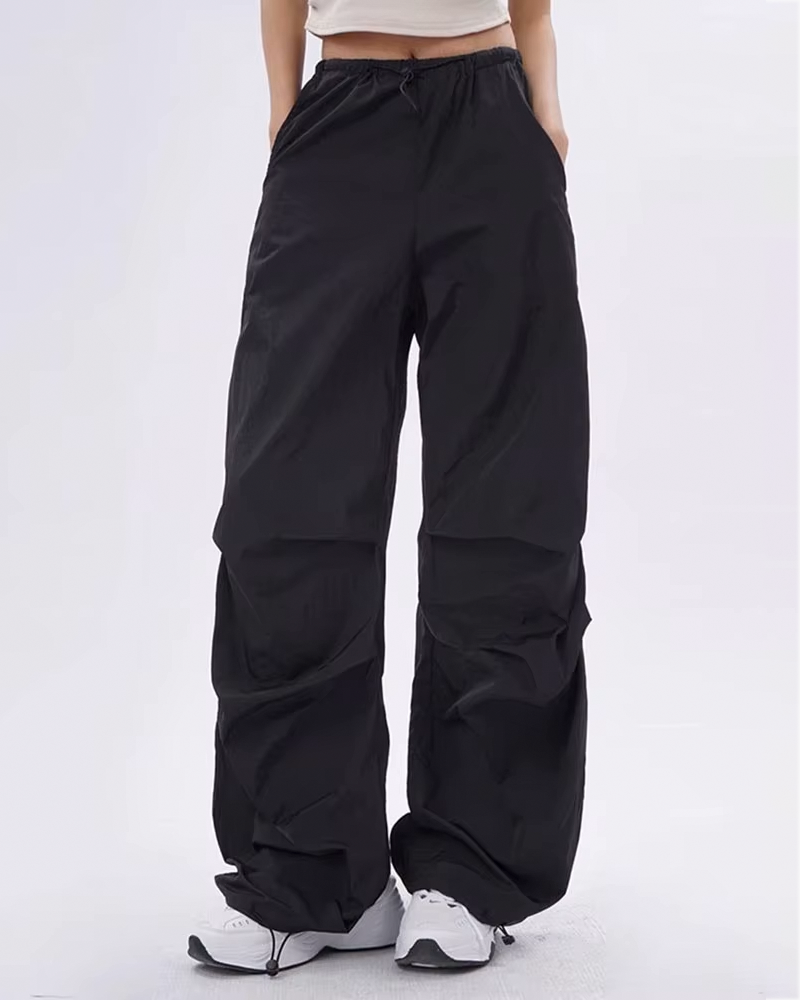 Black parachute pants