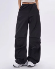 Black parachute pants