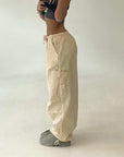 Beige parachute pants