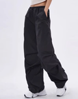 Black parachute pants