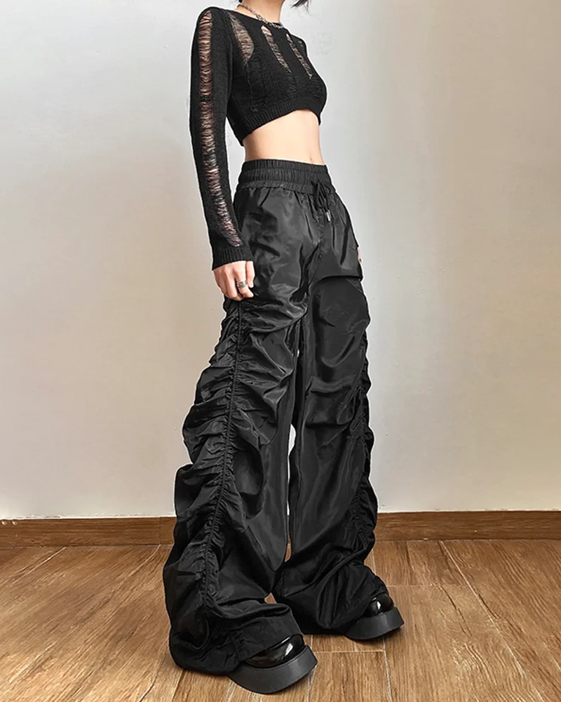 Women&#39;s black parachute pants