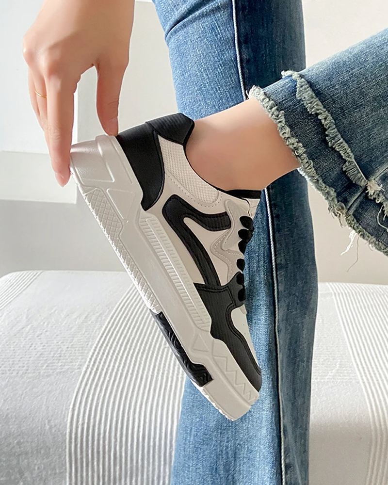 Black and white women&#39;s sneakers