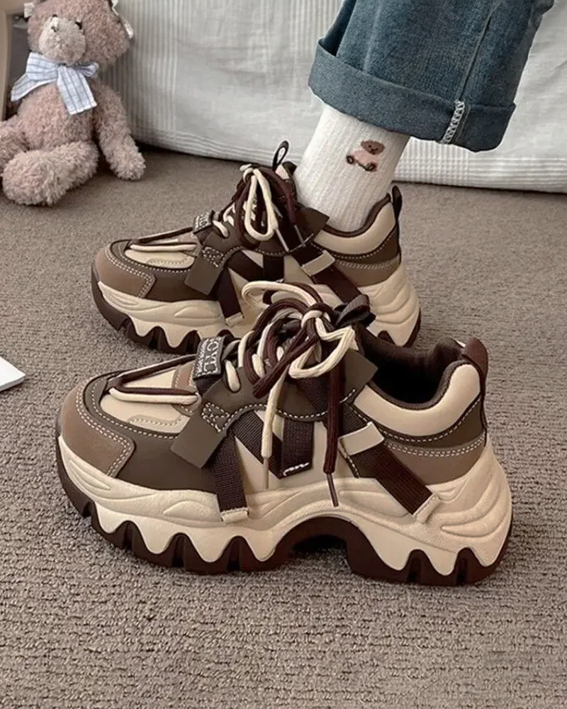 White and brown women&#39;s sneakers