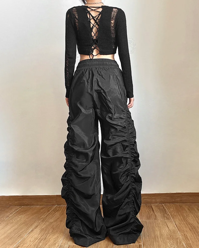 Women&#39;s black parachute pants