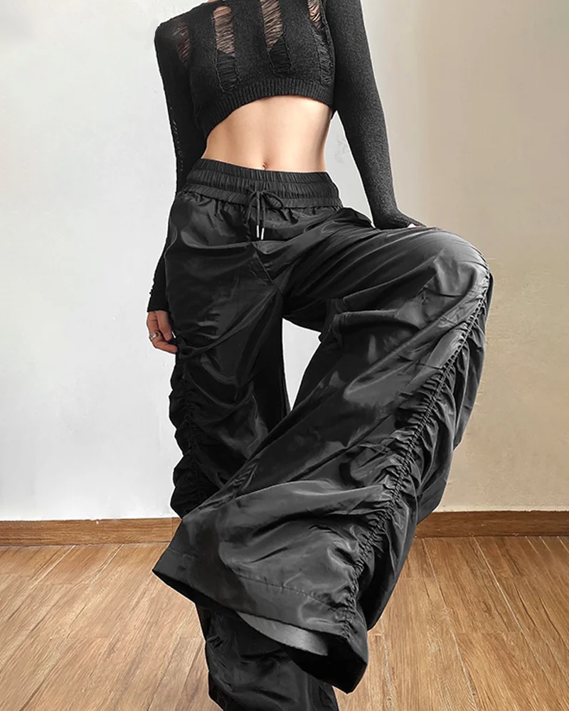 Women&#39;s black parachute pants