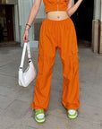 Orange parachute pants