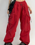 Red parachute pants