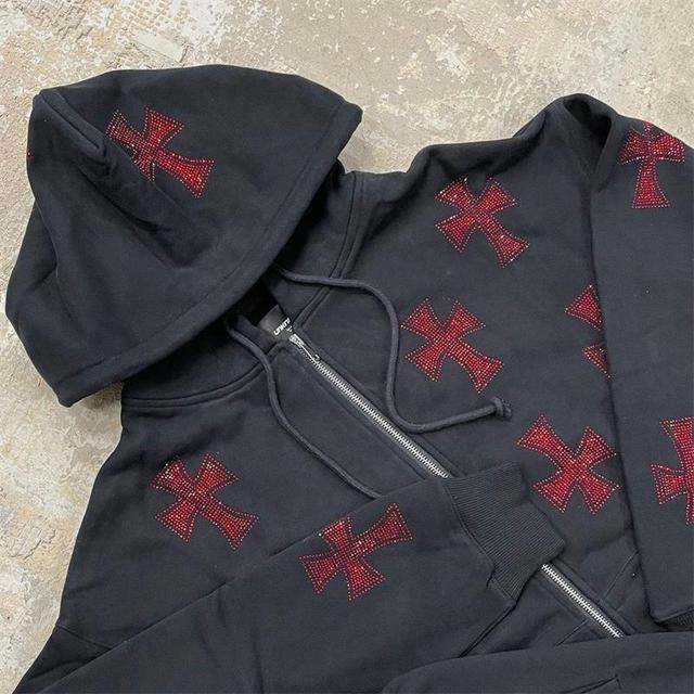 Jacket with shiny rhinestone cross