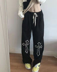 Pants with crosses