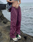 Purple track pants