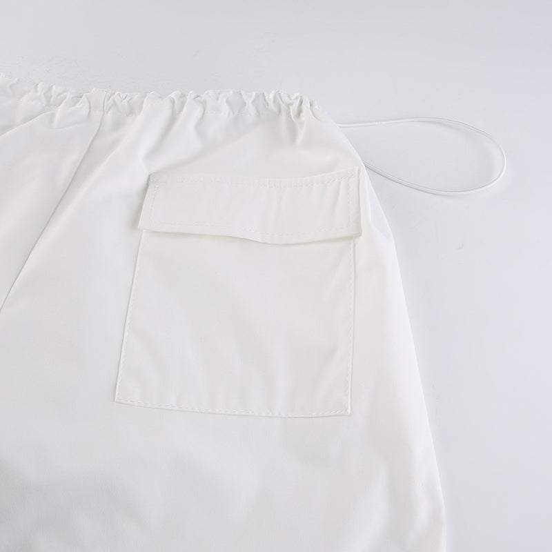 White parachute pants