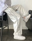 White wide trousers