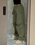 Green parachute pants