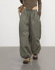 Green parachute pants