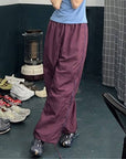 Purple track pants