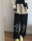 Pants with crosses