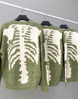 Green skeleton sweater